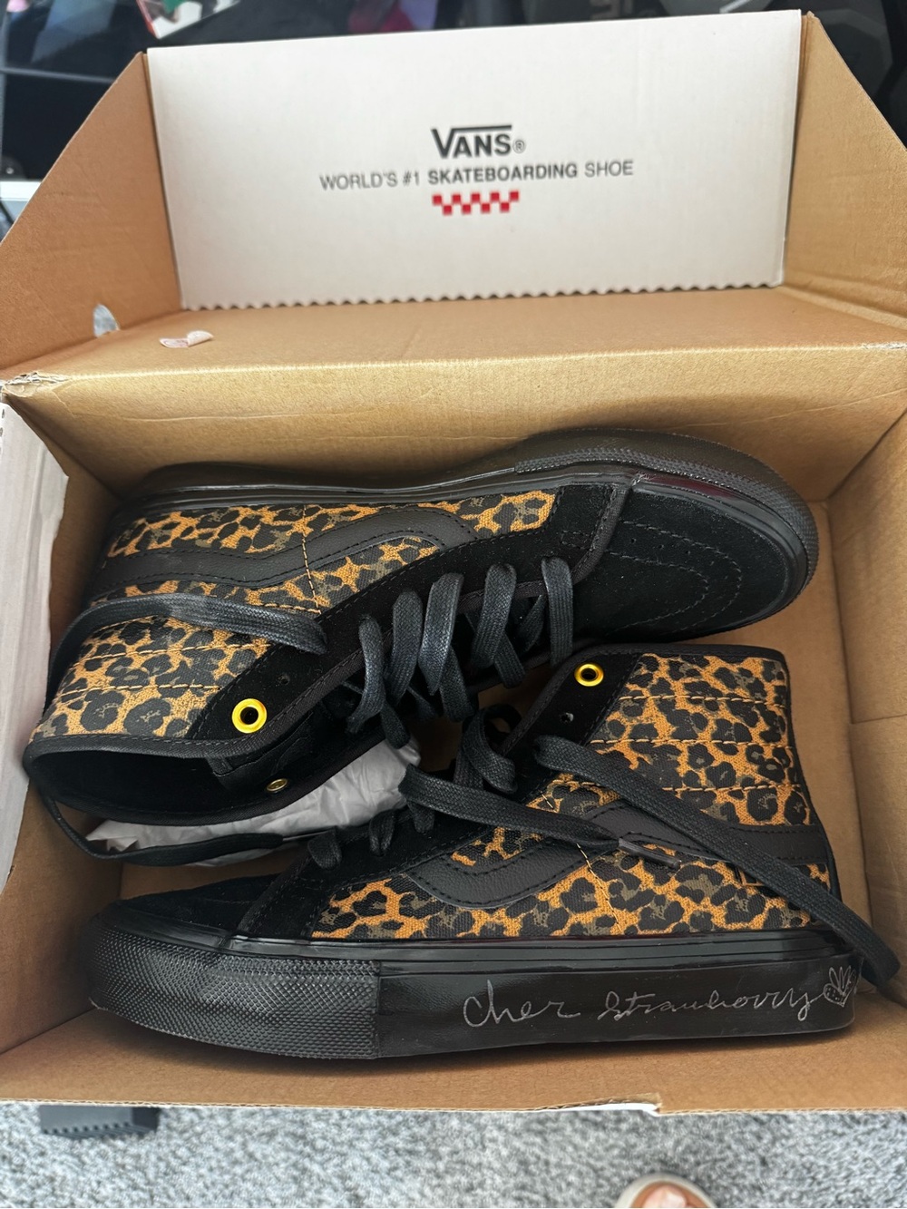 Vans High-Top Sneakers in Black and Leopard Print with Yellow Eyelets